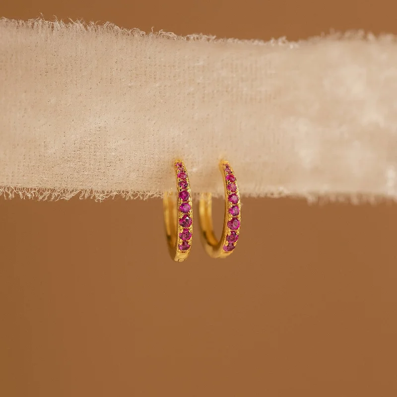 women luxury gold earrings -Vera Ruby Birthstone Huggies