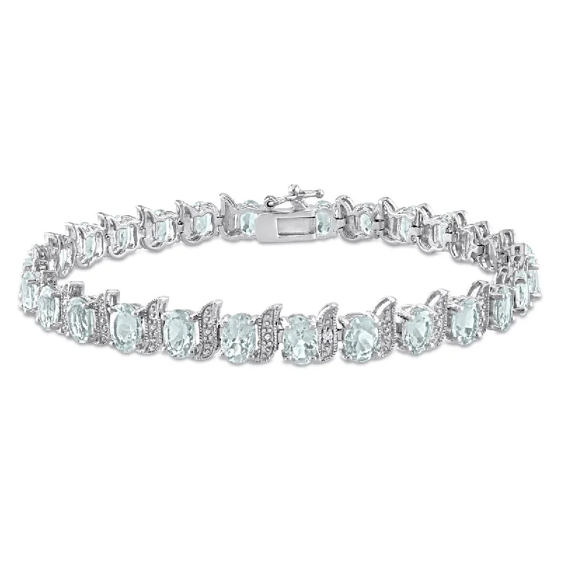 women gemstone bangles -Miadora 11 1/5ct TGW Oval Aquamarine Diamond Accent S Link Tennis Bracelet Sterling Silver