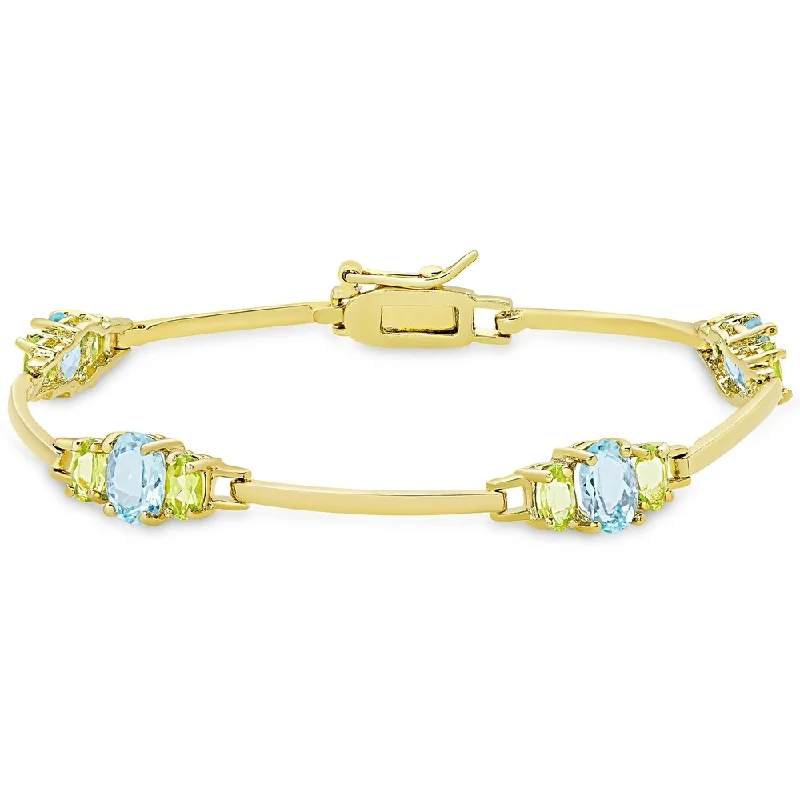 women bracelet sets -Dolce Giavonna Gold over Silver Blue Topaz and Peridot Bracelet