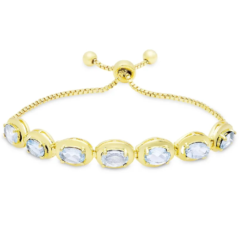 women bracelets -Dolce Giavonna Gold Overlay Blue Topaz Oval Adjustable Slider Bracelet