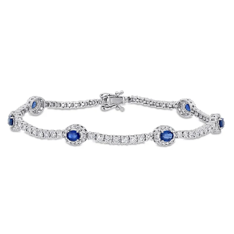 women eco-friendly bracelets -Miadora 14k White Gold 2 1/10ct TDW Diamond and Oval Sapphire Halo Station Tennis Bracelet