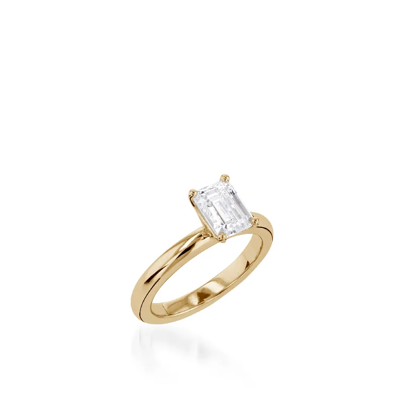 women emerald engagement rings -Essence Solitaire Emerald Cut Yellow Gold Engagement Ring