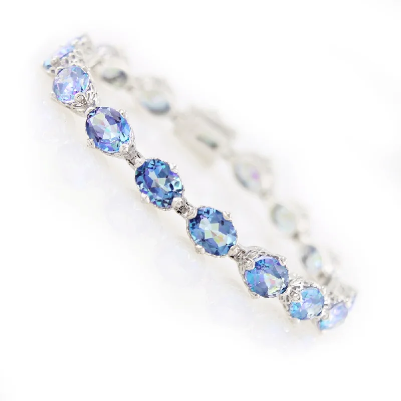 women silver bracelets -Platinum Over Sterling Silver Blue Millenium Topaz Tennis Bracelet