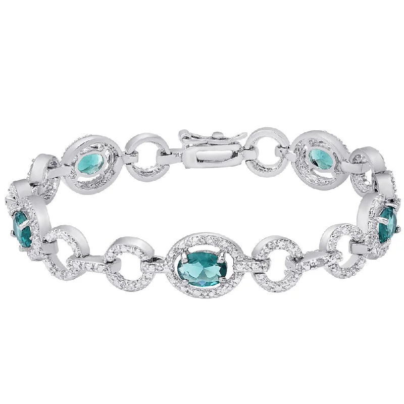 women customized charm bracelets -Dolce Giavonna Silver Overlay Simulated London Blue Topaz and Diamond Accent Oval Link Bracelet