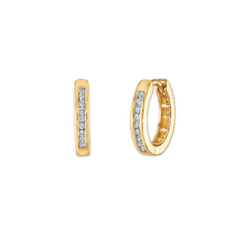 women unique earrings -1/10 CTW Diamond Huggie Earrings in 10KT Yellow Gold