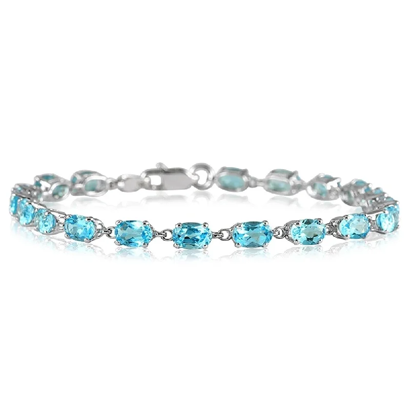 women double bangle bracelets -Marquee 10 1/2 Carat Oval Blue Topaz Bracelet in 10K White Gold